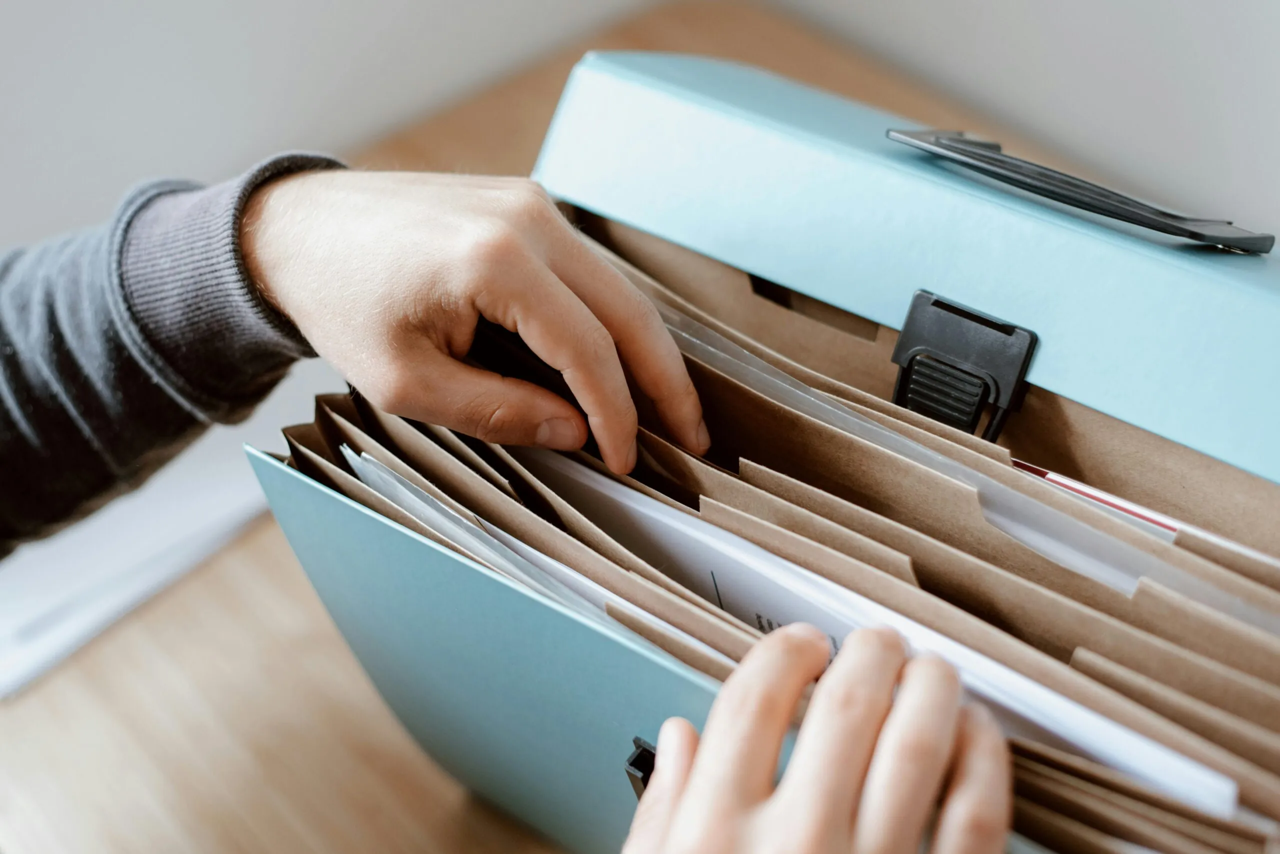 Event organiser reviewing licensing documents required for corporate events in Singapore